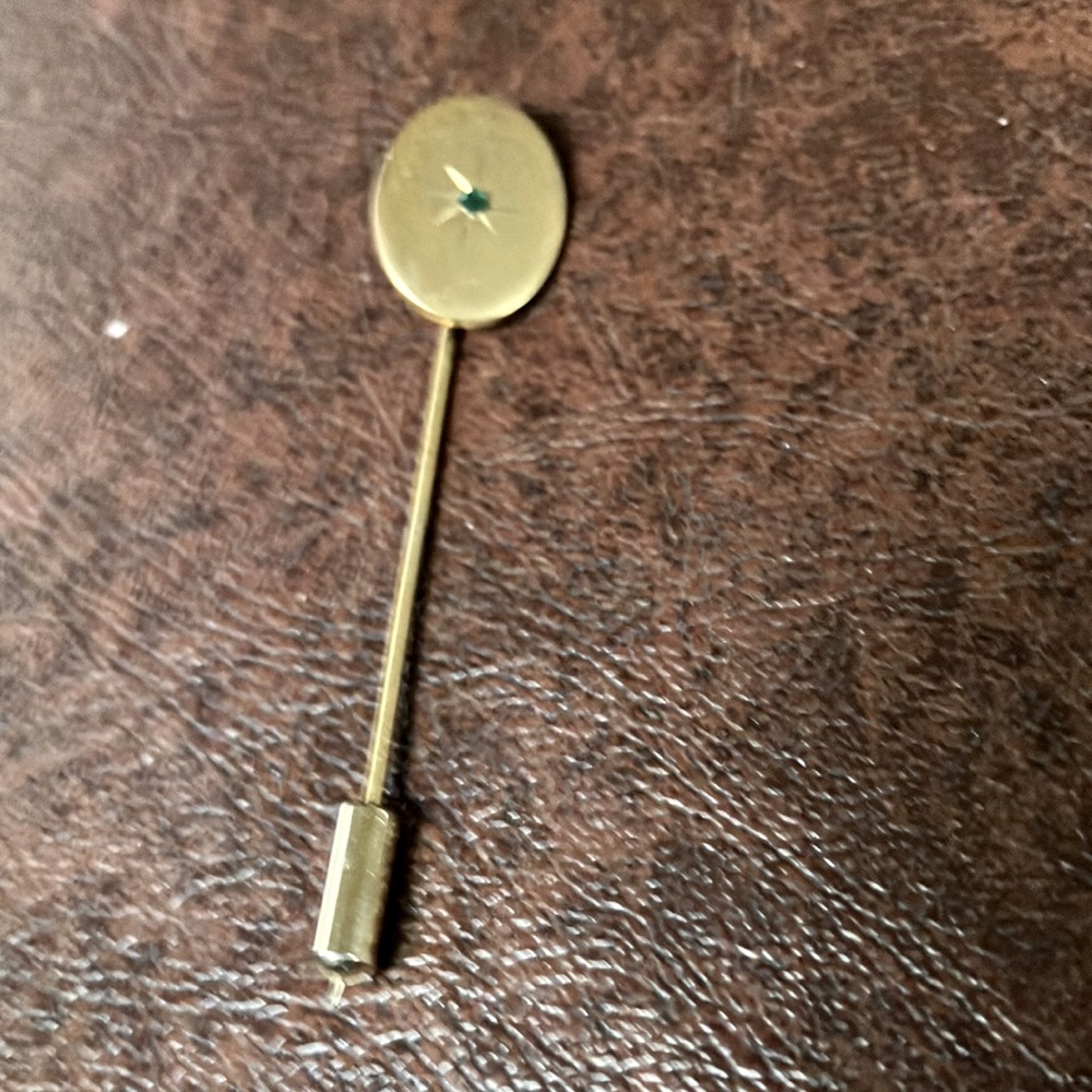 Vintage stick pin with emerald